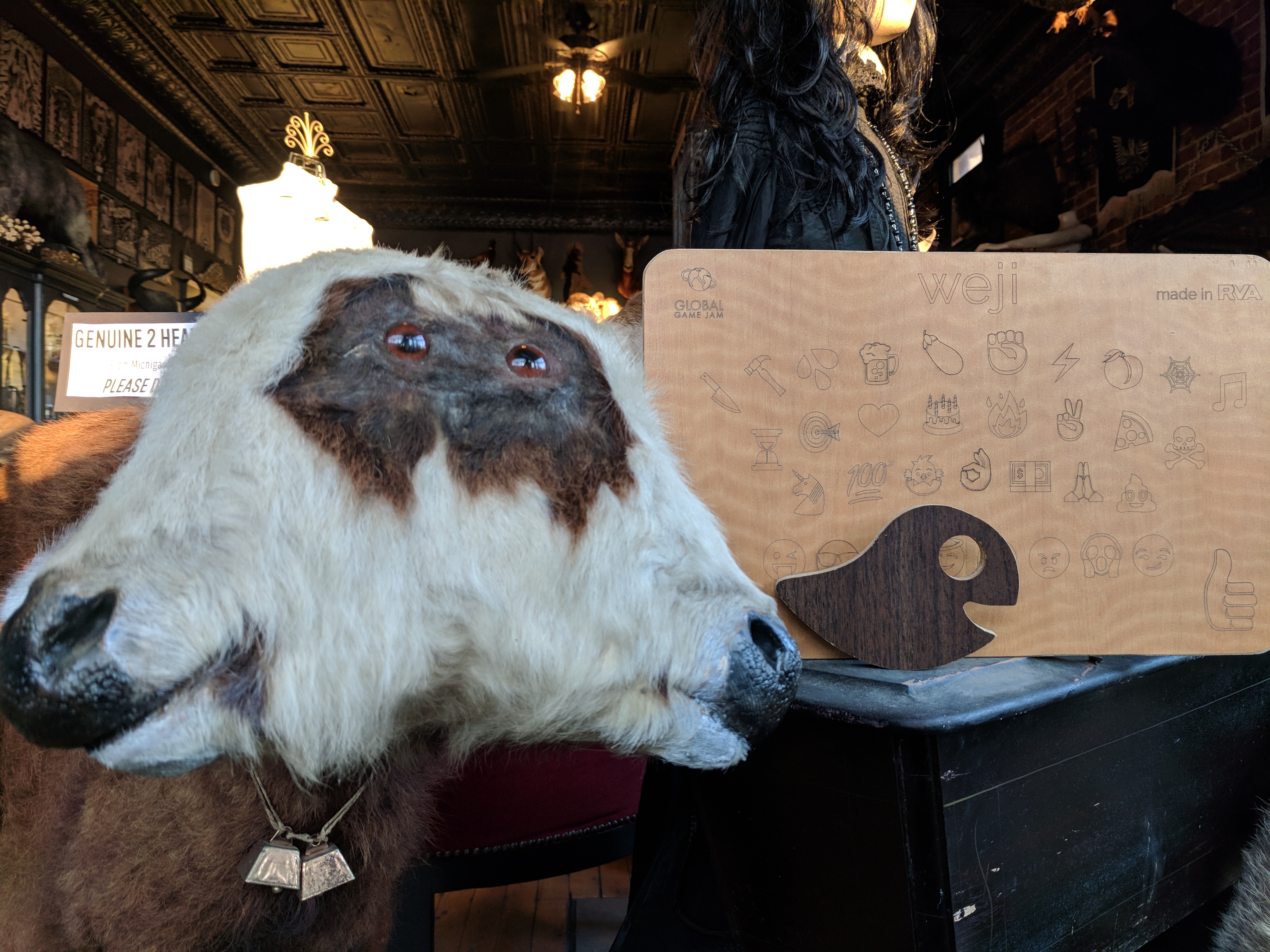 Weji emoji ouija board with planchette